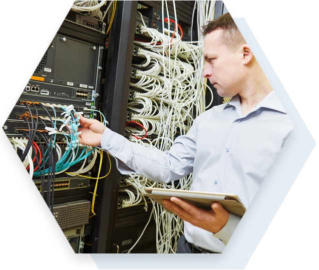 IT Professional Working on Network Man Performing Managed Backup and Recovery